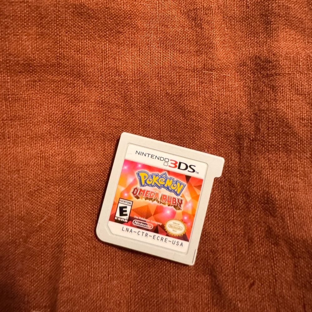Nintendo 3DS Pokémon Omega Ruby Cartridge - Red and Orange